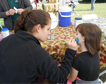 Faith Jessee face painting in 2015
